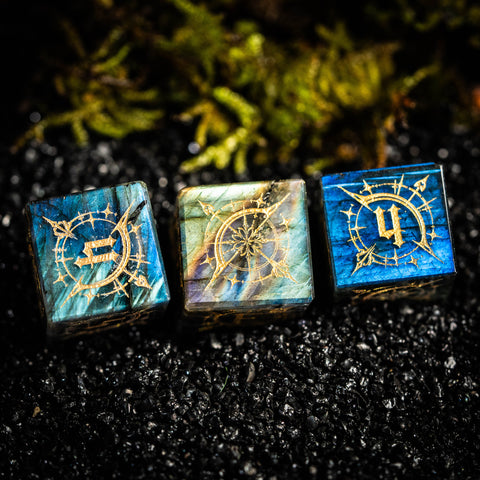 three dices sitting on top of a black surface