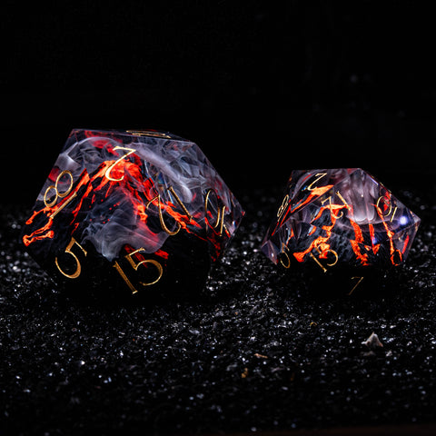 a couple of dices sitting on top of a black surface