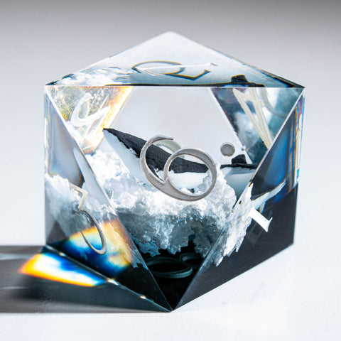 a diamond shaped object with a ring on top of it