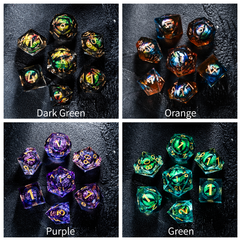 a group of different colored dices sitting on top of a table