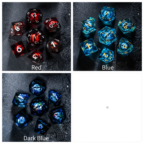 a group of different colored dices sitting on top of a table