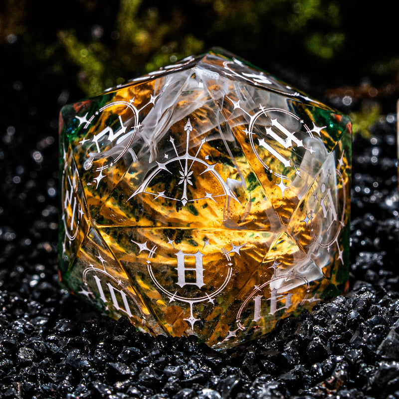 a close up of a dice on a black surface