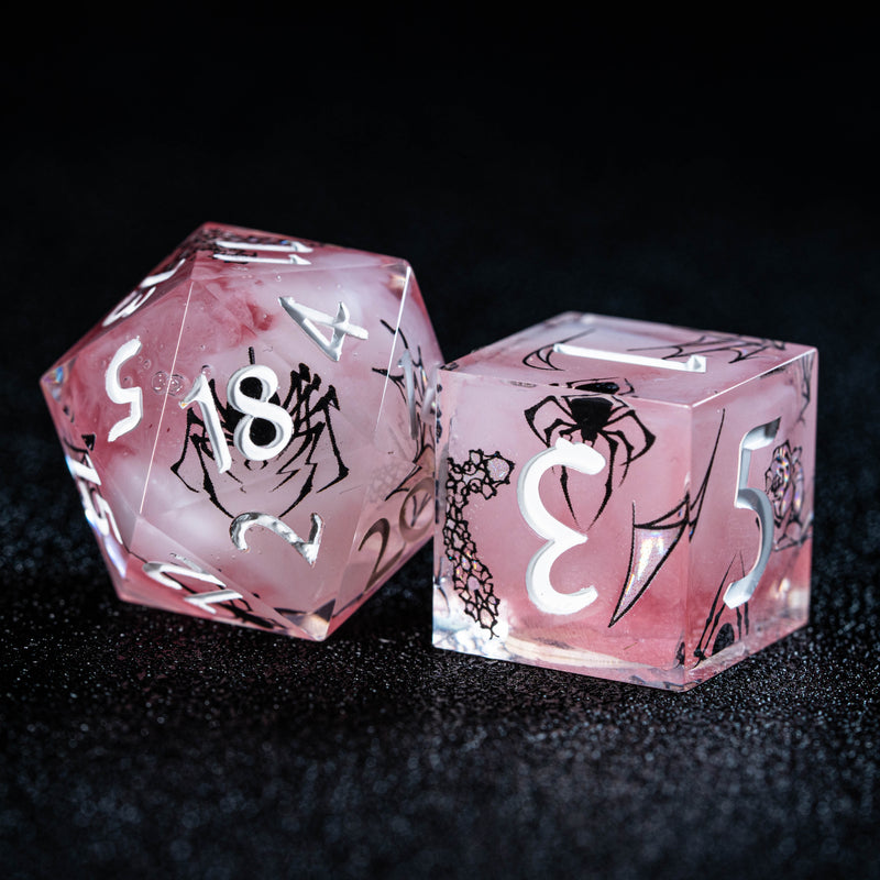 two pink dices with white numbers on them