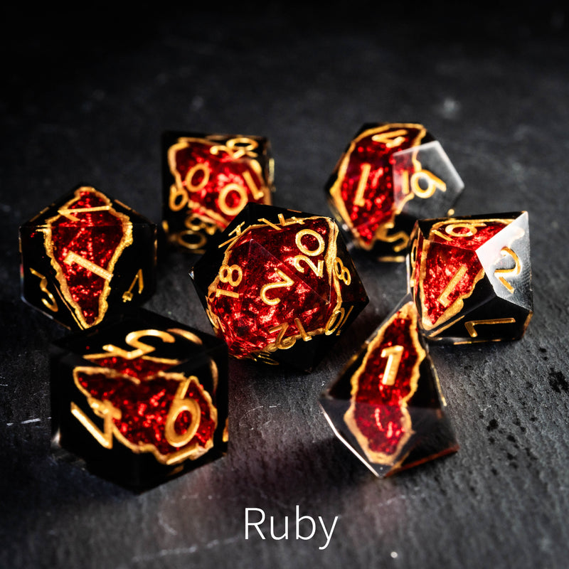 a group of red and gold dices sitting on top of a table