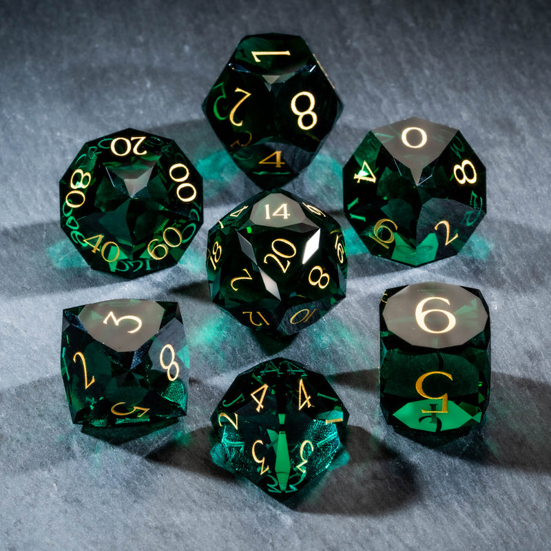 a group of green dice sitting on top of a table