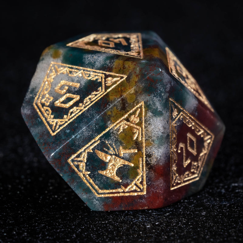 a close up of a dice on a black surface