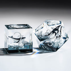 a couple of ice cubes sitting on top of a table