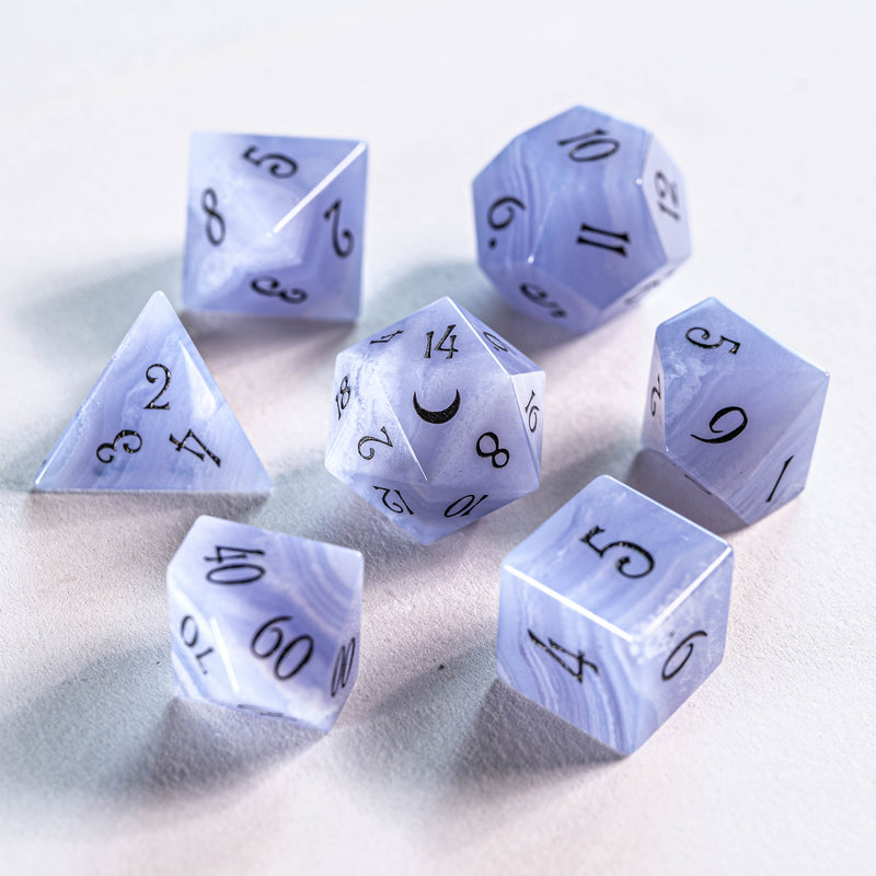 a group of dices sitting on top of a table