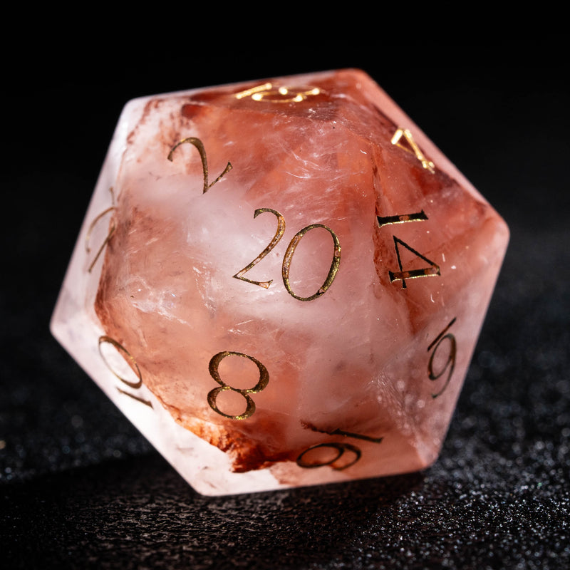 a close up of a dice on a table