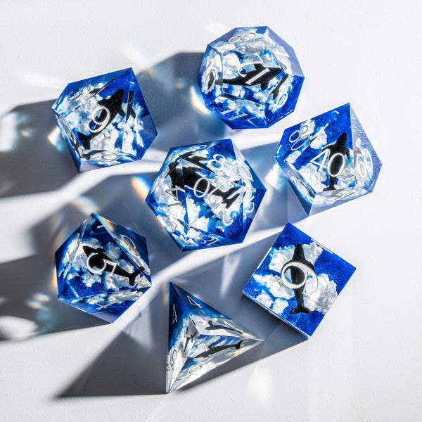 a group of blue and white dices laying on top of each other