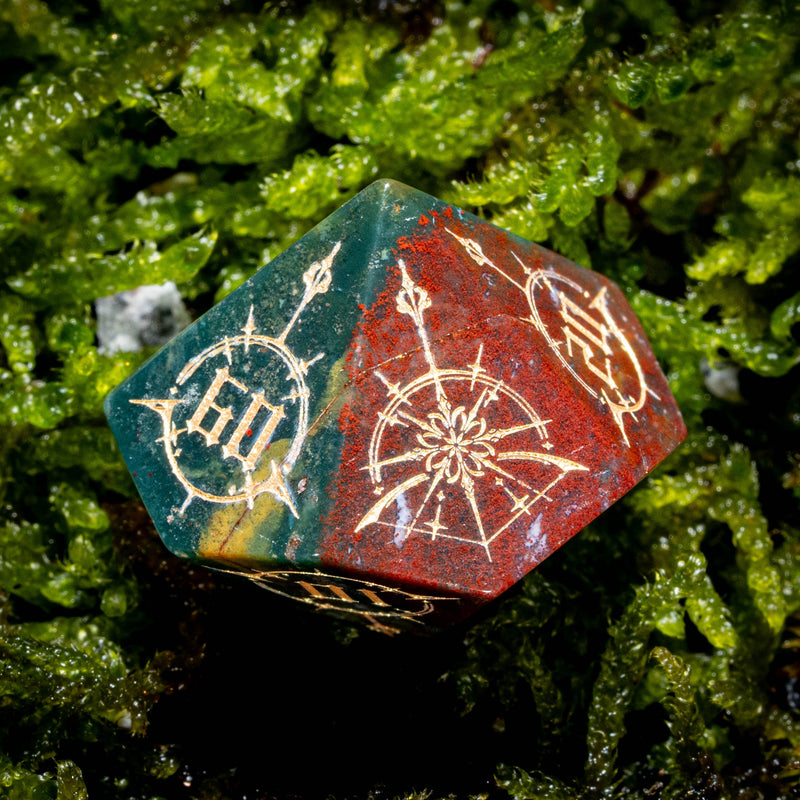 a red and green rock with some writing on it