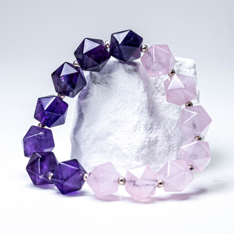 a bracelet made of purple and pink glass beads