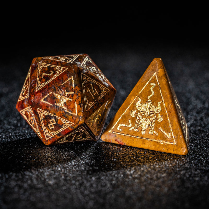 two wooden dices sitting on top of a table