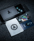 a black box with a white towel and some dice