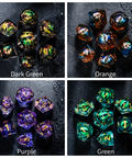 a group of different colored dices sitting on top of a table