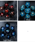 a group of different colored dices sitting on top of a table